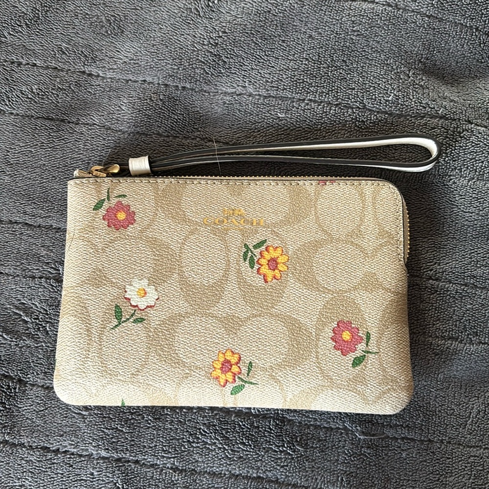 Coach tan with flowers wristlet